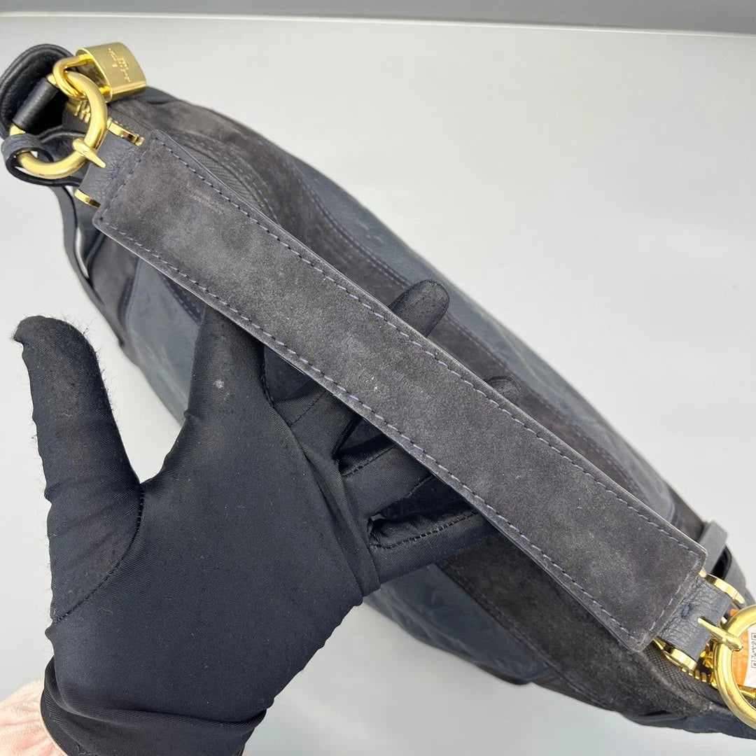 Louis Vuitton Sally Monogram Empreinte Suede tote Top Handle Black Gold