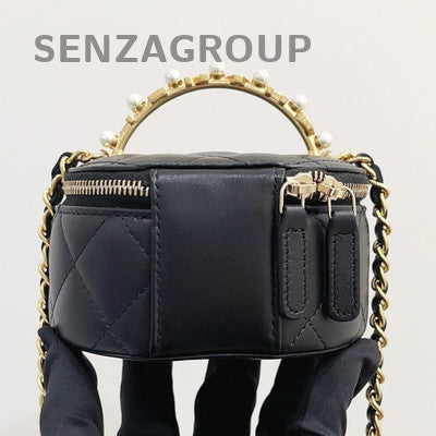 Chanel Black Gold Lambskin Mini Round Barrel Bag Chain Crossbody