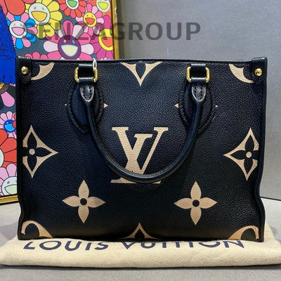 Louis Vuitton OnTheGo MM Monogram Empreinte Leather Tote Bag Black White