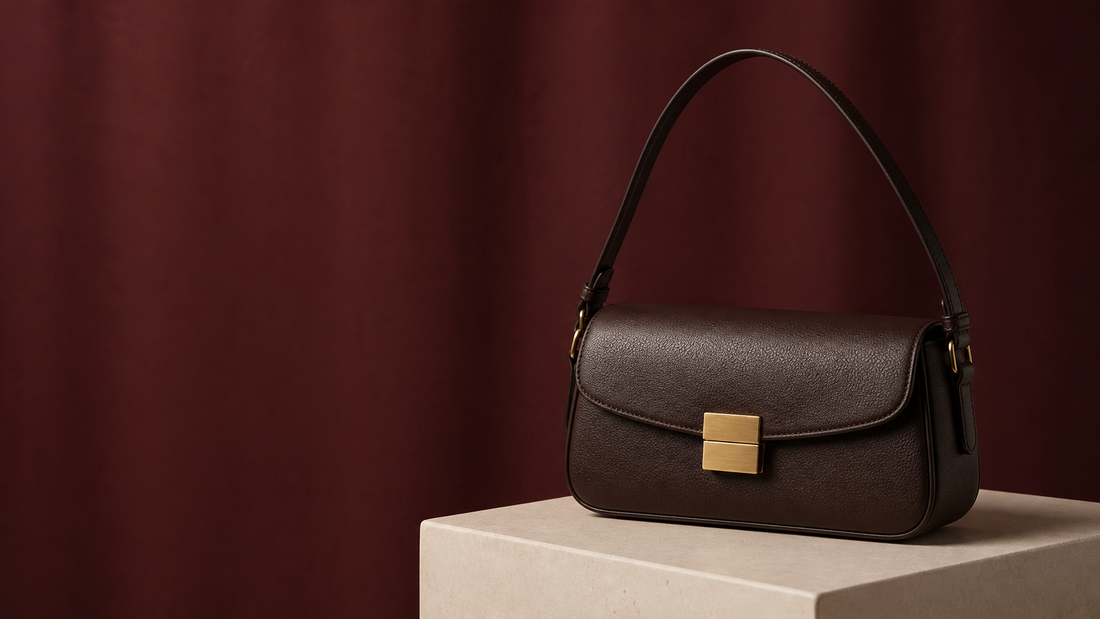 Logo-free editorial shoulder bag still life for a pre-owned Fendi Baguette buyer's guide