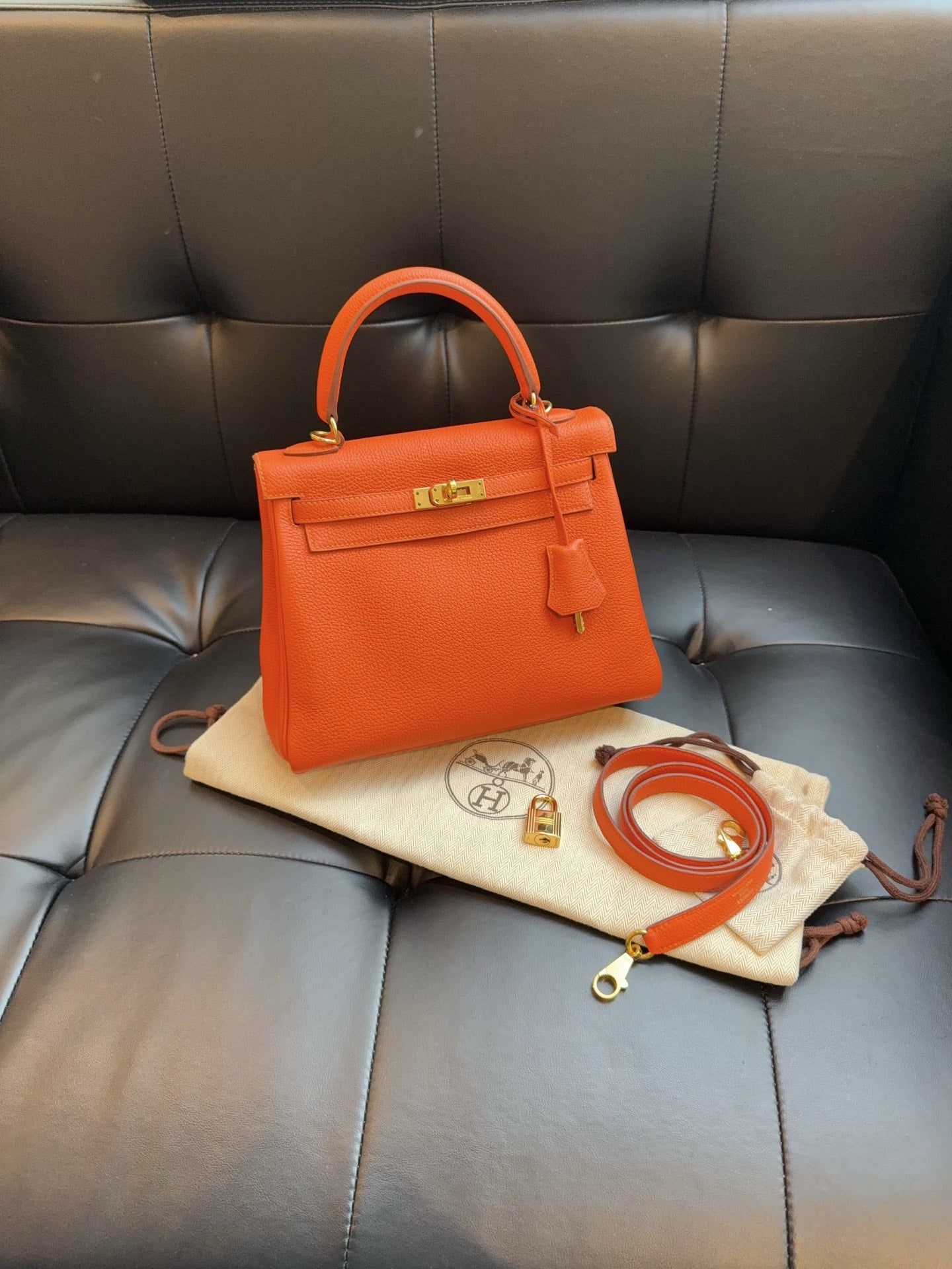 Hermès Kelly 25 Sellier in Orange Togo Leather with Gold Hardware