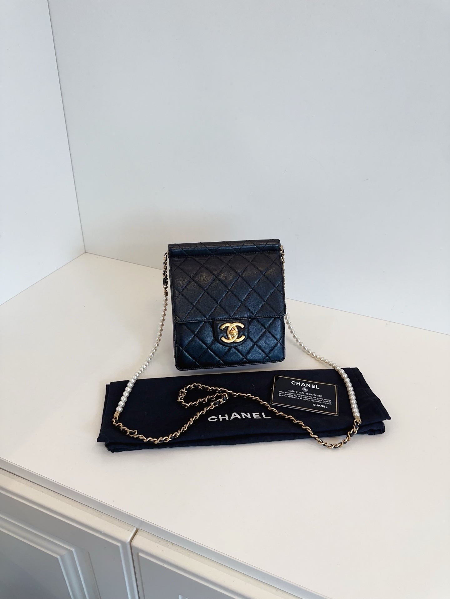 CHANEL Mini Vertical Flap Bag with Pearl Chain - Black & Gold-Tone Hardware