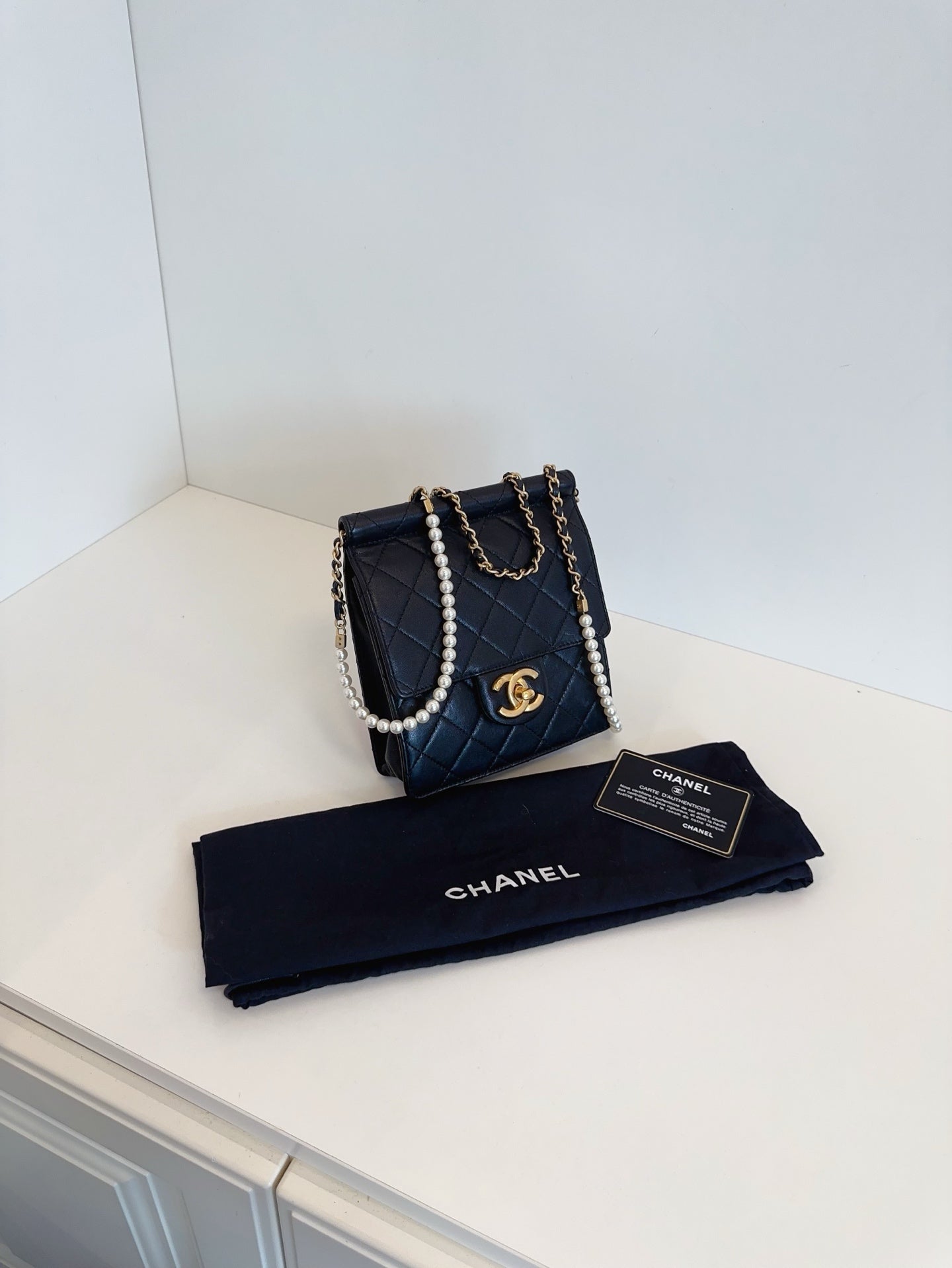 CHANEL Mini Vertical Flap Bag with Pearl Chain - Black & Gold-Tone Hardware