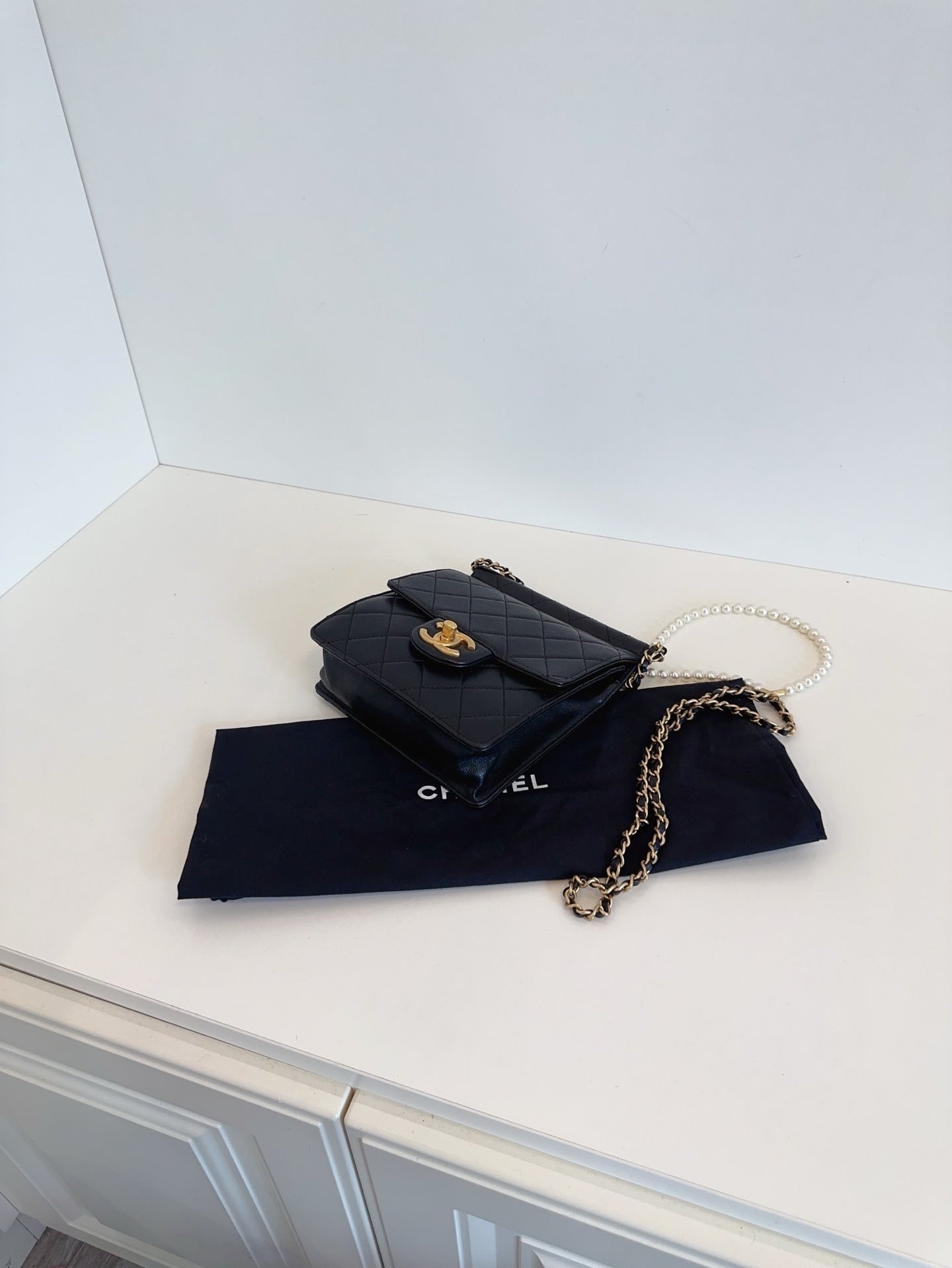 CHANEL Mini Vertical Flap Bag with Pearl Chain - Black & Gold-Tone Hardware
