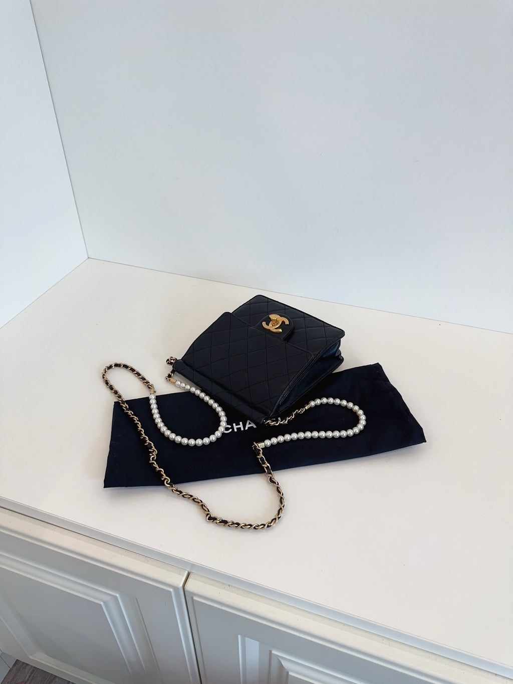 CHANEL Mini Vertical Flap Bag with Pearl Chain - Black & Gold-Tone Hardware - Pre-Owned