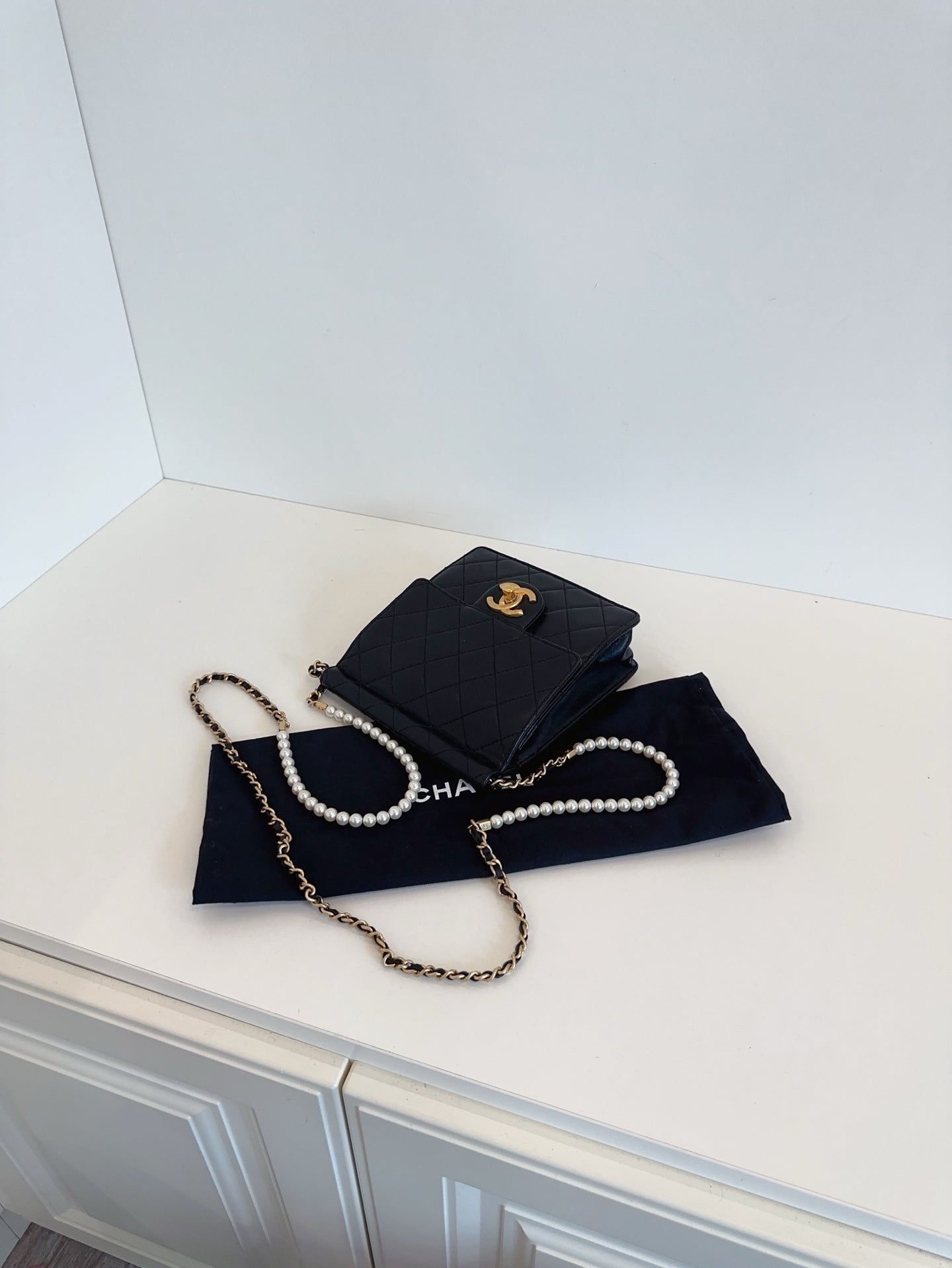 CHANEL Mini Vertical Flap Bag with Pearl Chain - Black & Gold-Tone Hardware