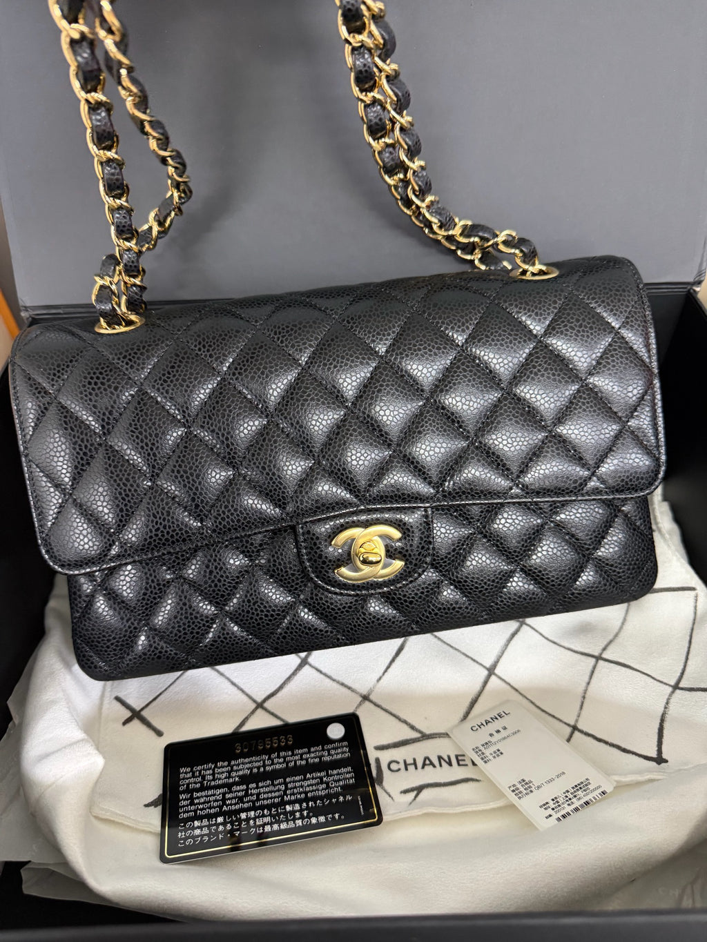 Chanel Medium Classic Flap in Black Caviar with Gold Hardware. 30-series. - Pre-Owned