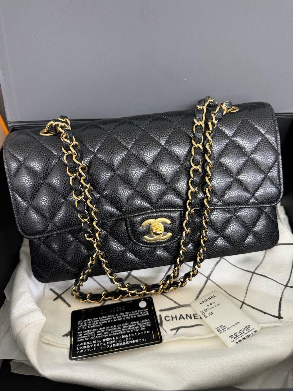Chanel Medium Classic Flap in Black Caviar with Gold Hardware. 30-series. - Pre-Owned