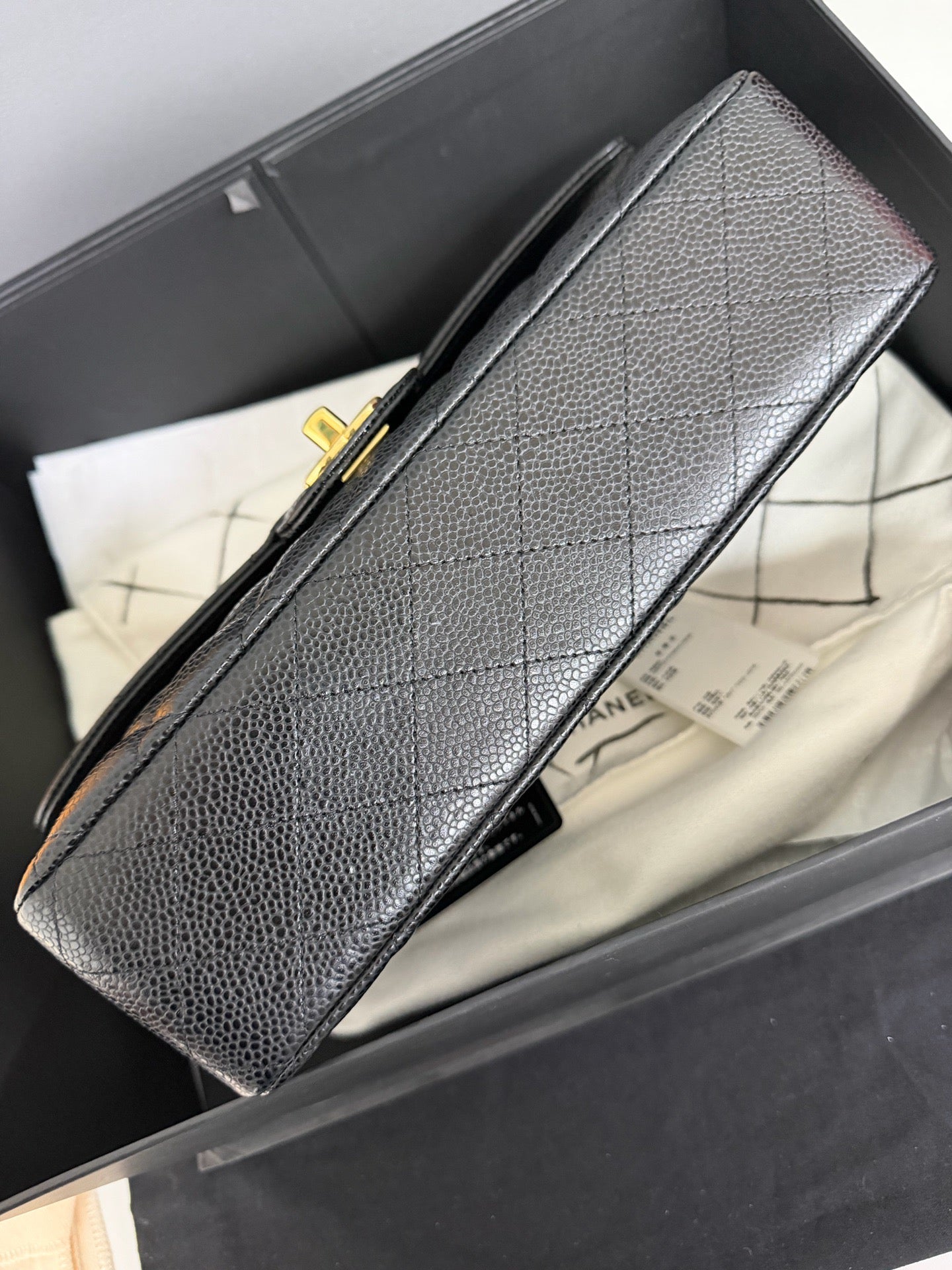 Chanel Medium Classic Flap in Black Caviar with Gold Hardware. 30-series.