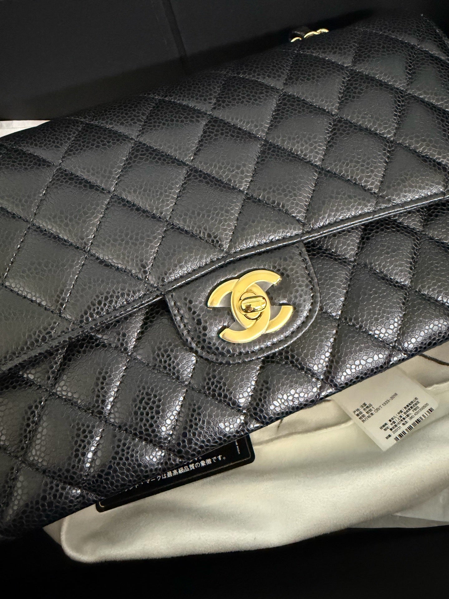 Chanel Medium Classic Flap in Black Caviar with Gold Hardware. 30-series.