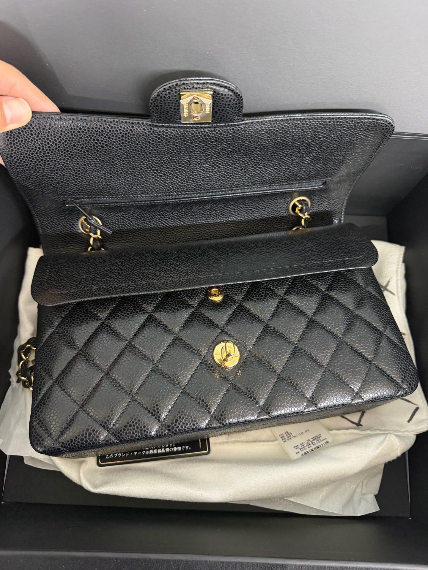 Chanel Medium Classic Flap in Black Caviar with Gold Hardware. 30-series.