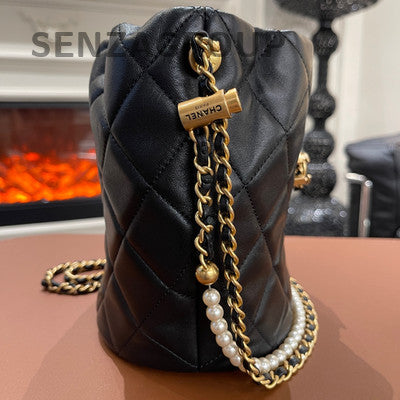 Chanel Quilted Pearl Drawstring Chain Bucket Bag Black Gold Shoulder Bag