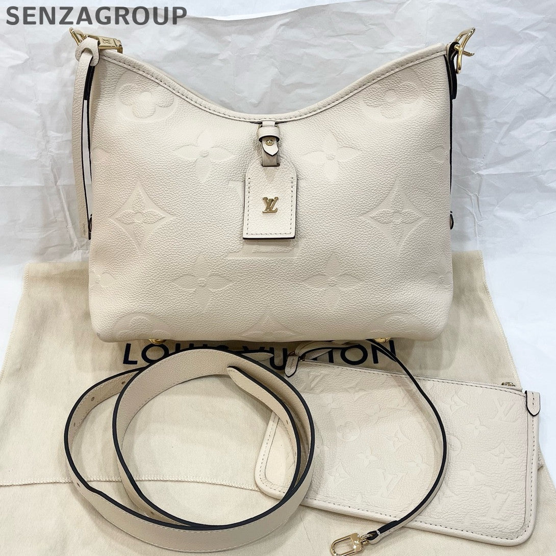 Louis Vuitton Monogram Empreinte Leather Carryall PM Bag White Gold