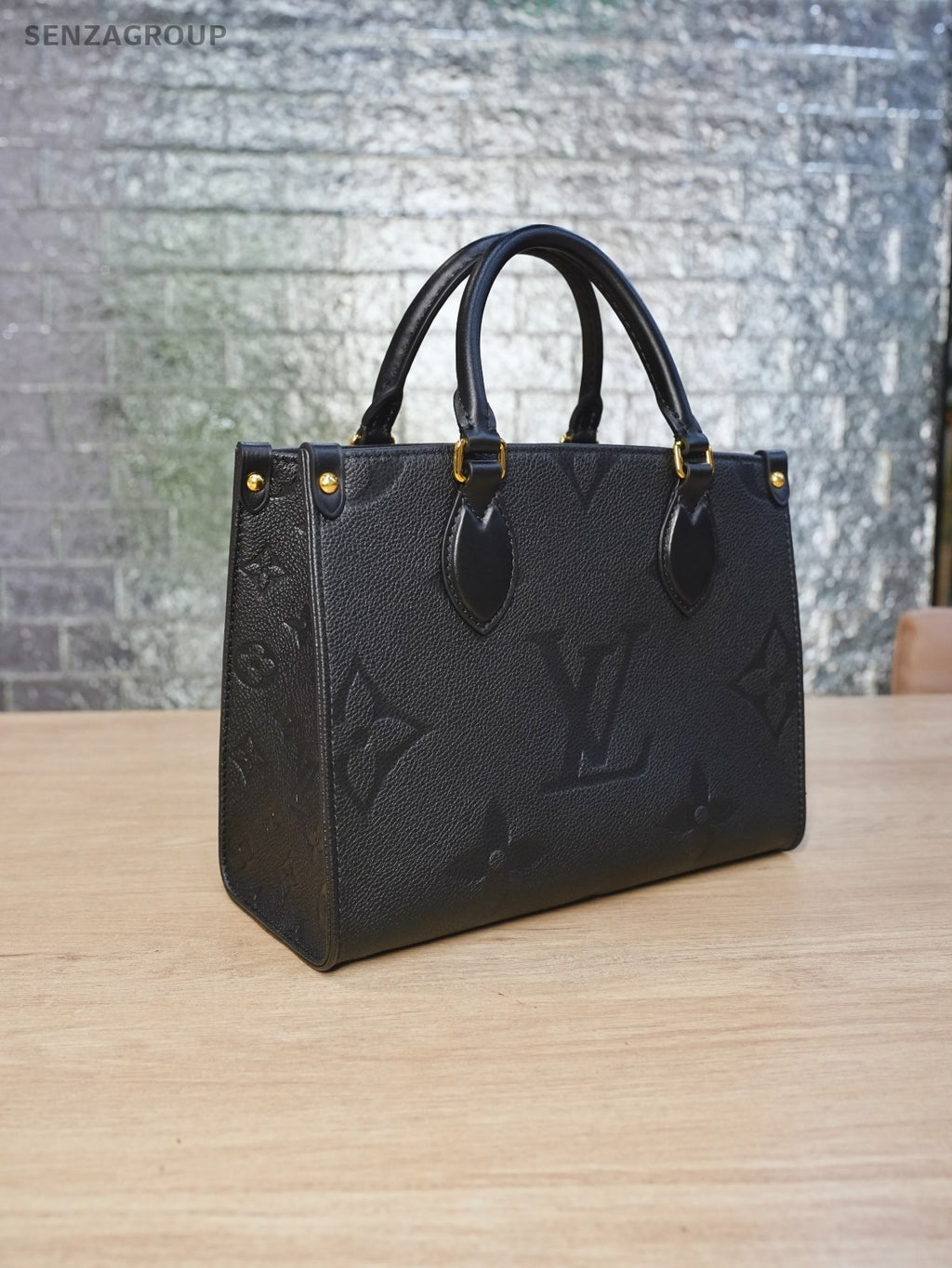 LOUIS VUITTON black Monogram Empriente ON THE GO PM almost brand new