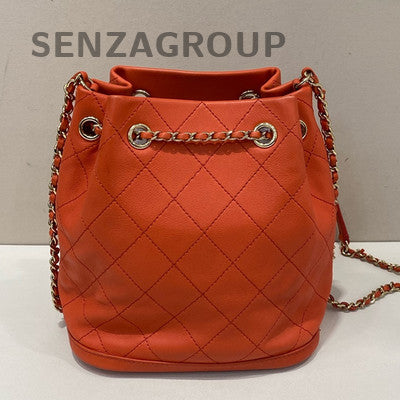 Chanel Quilted Drawstring Bucket Bag Red Gold Chain Shoulder Crossbody