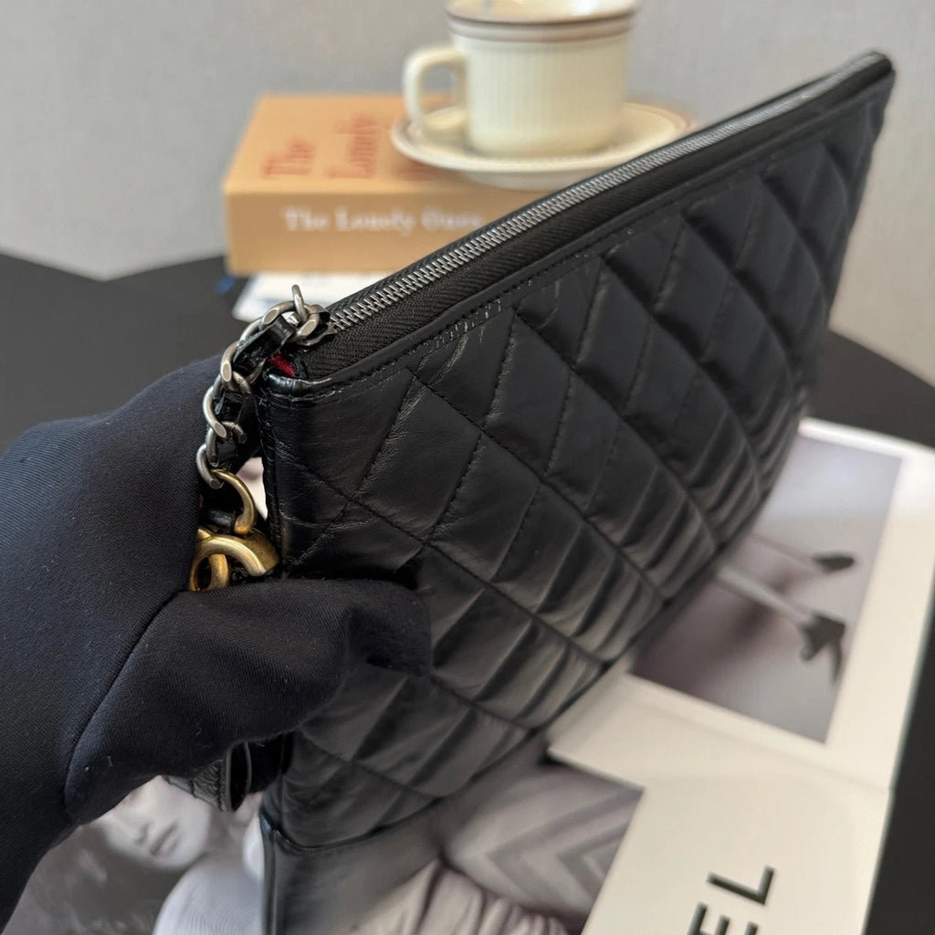 Authentic Chanel Calfskin MM Diamond Black Clutch Bag Gold Hardware
