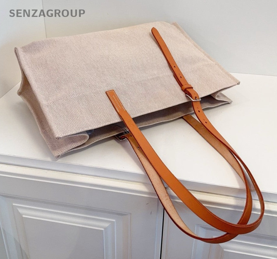 Hermes Etriviere Tote Beige Canvas with golden-brown leather shoulder strap
