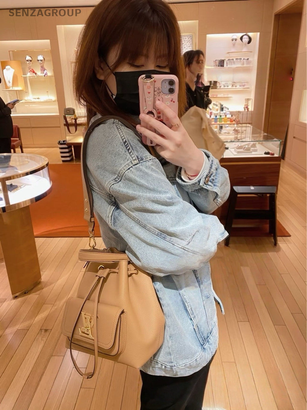 Louis Vuitton Lockme Bucket Drawstring Shoulder Crossbody Bag Brown Women