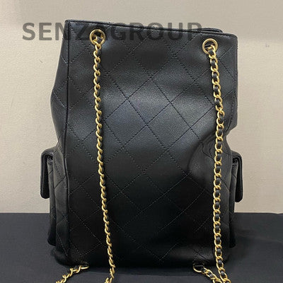 Chanel 25C Black Gold Drawstring Bucket Backpack Quilted Lambskin Classic