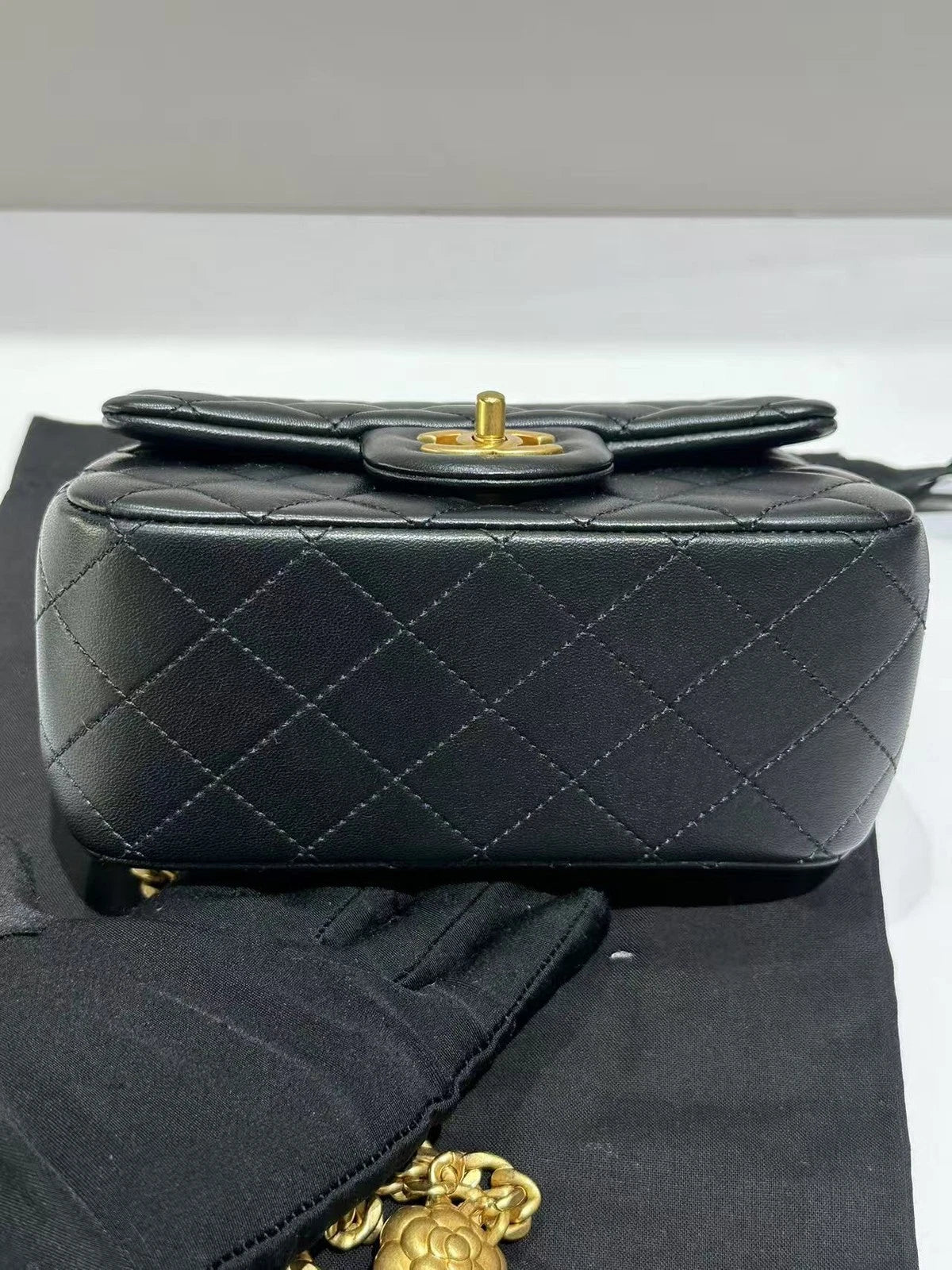 CHANEL Camellia Buckle Black Gold Mini Crossbody Bag For Women