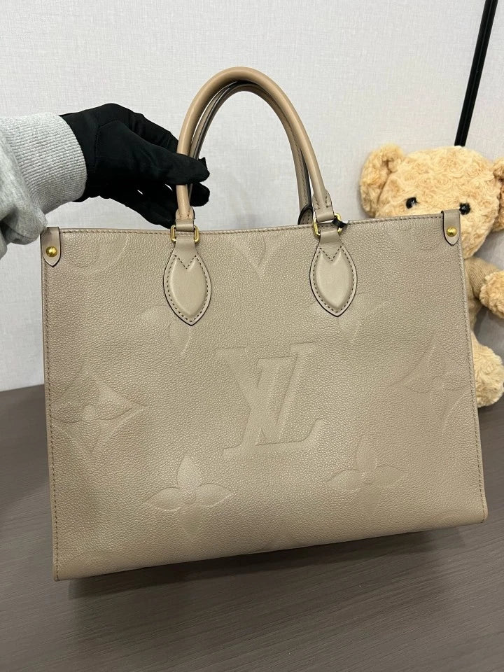 Louis Vuitton Embossed Medium On The Go Tote Bag For Women