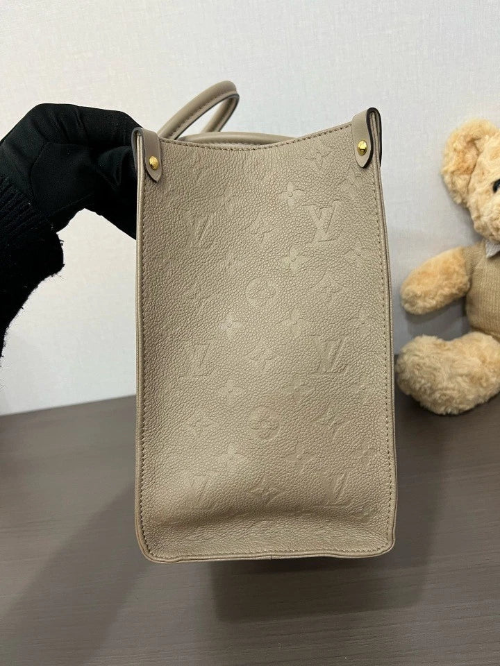 Louis Vuitton Embossed Leather MM OnTheGo Tote Bag For Women