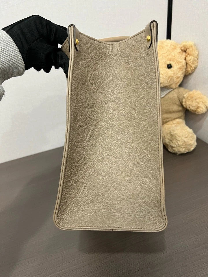 Louis Vuitton Embossed Medium On The Go Tote Bag For Women