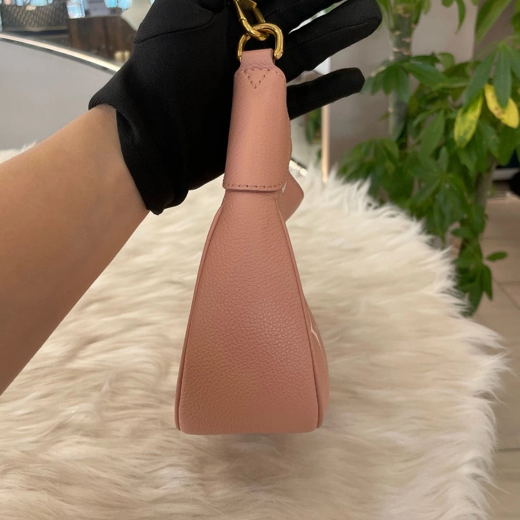 Louis Vuitton Monogram Empreinte Leather Pochette Métis Pink Gold