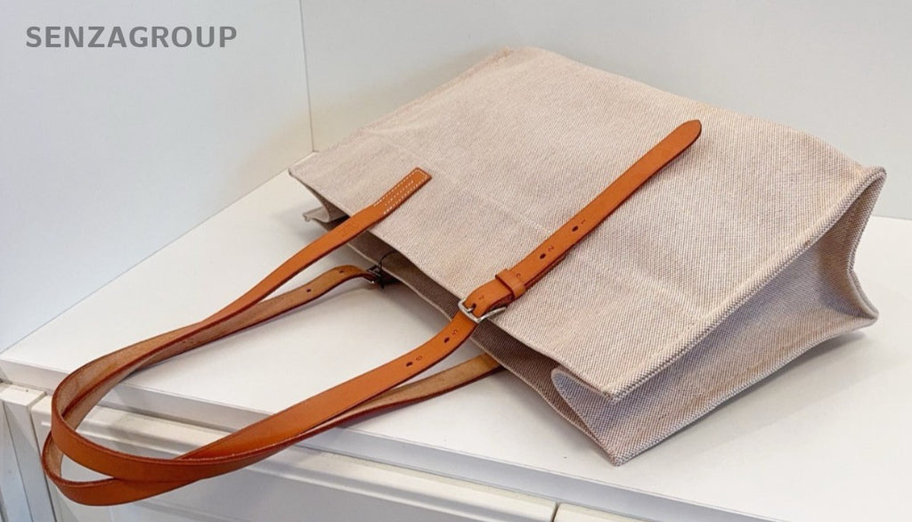 Hermes Etriviere Tote Beige Canvas with golden-brown leather shoulder strap