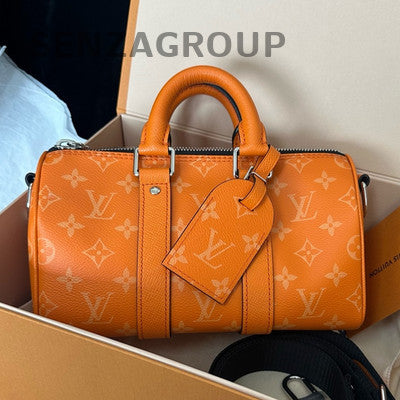 Louis Vuitton Taïga Calfskin Keepall 25 Orange Unisex Travel Bag