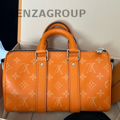 Louis Vuitton Taïga Calfskin Keepall 25 Orange Unisex Travel Bag