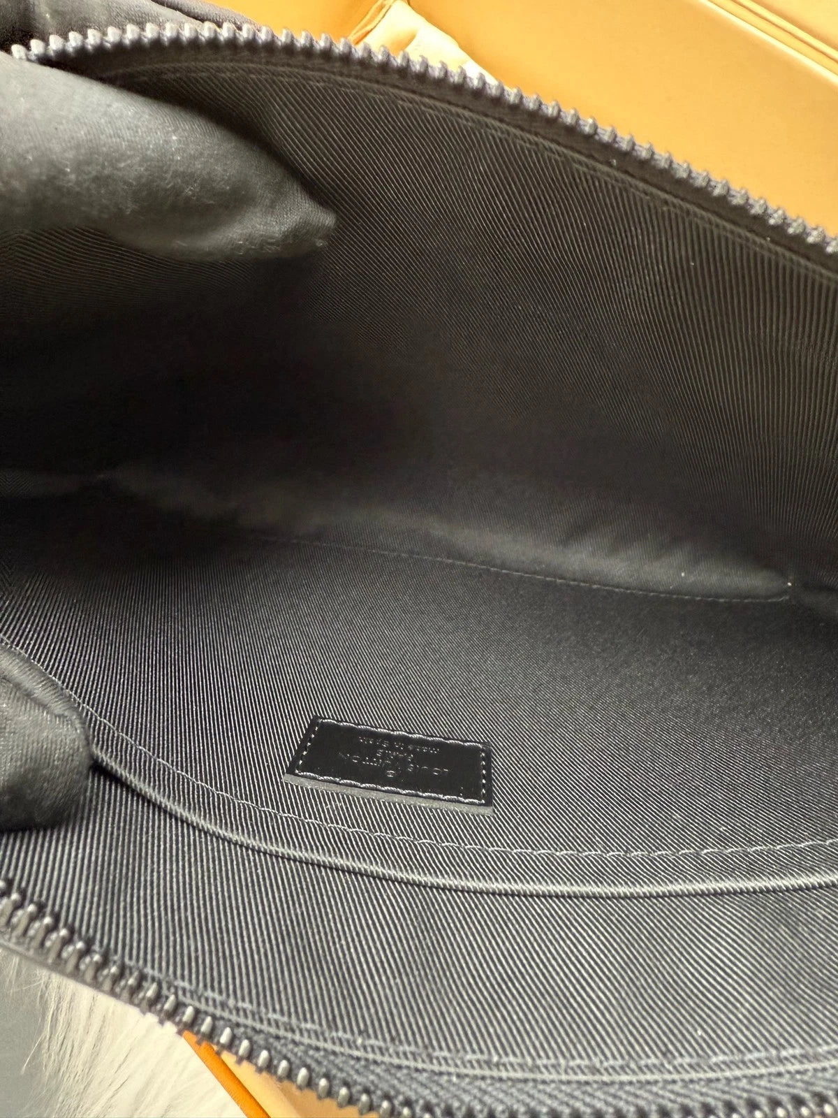 Louis Vuitton Black Monogram Embossed Leather Clutch Women