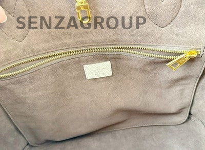 Louis Vuitton Neverfull PM Monogram Empreinte Leather Shoulder Bag - White Gold