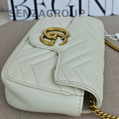Gucci Marmont Mini Chain Shoulder Bag in White Gold - Fashion Women