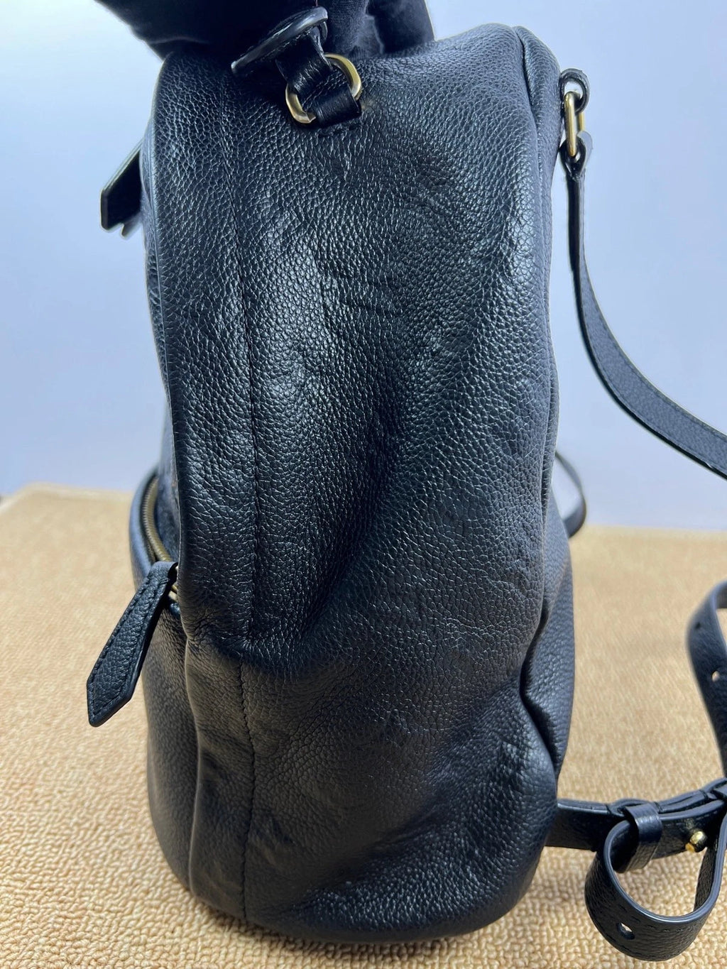 Louis Vuitton Sorbonne Monogram Empreinte Calfskin Backpack Black Gold Unisex