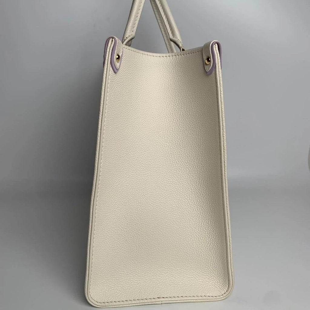 SJ0001 Louis Vuitton OnTheGo MM in Cream and Lilac Monogram Empreinte Leather Z