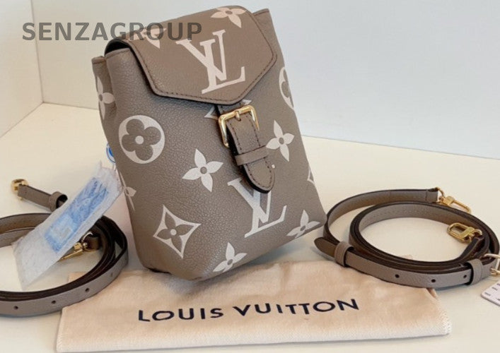 Louis Vuitton Tiny Backpack mini Elephant Grey Shoulder bag Almost BRAND NEW