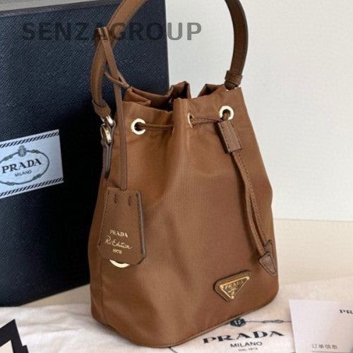 Prada Re-EditionRe-Nylon Mini Bucket Top Handle Bag Crossbody Brown Gold Women