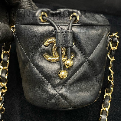 Chanel 21B Black Gold Mini Bucket Bag Lamb Leather Chain Crossbody