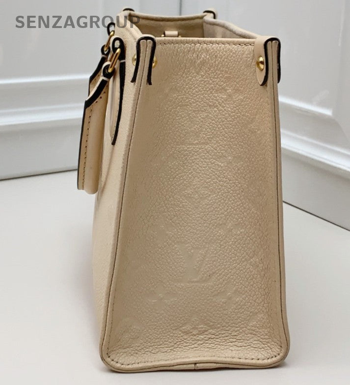Louis Vuitton OnTheGo Tote Calfskin Top Handle Bag Crossbody White Gold Women