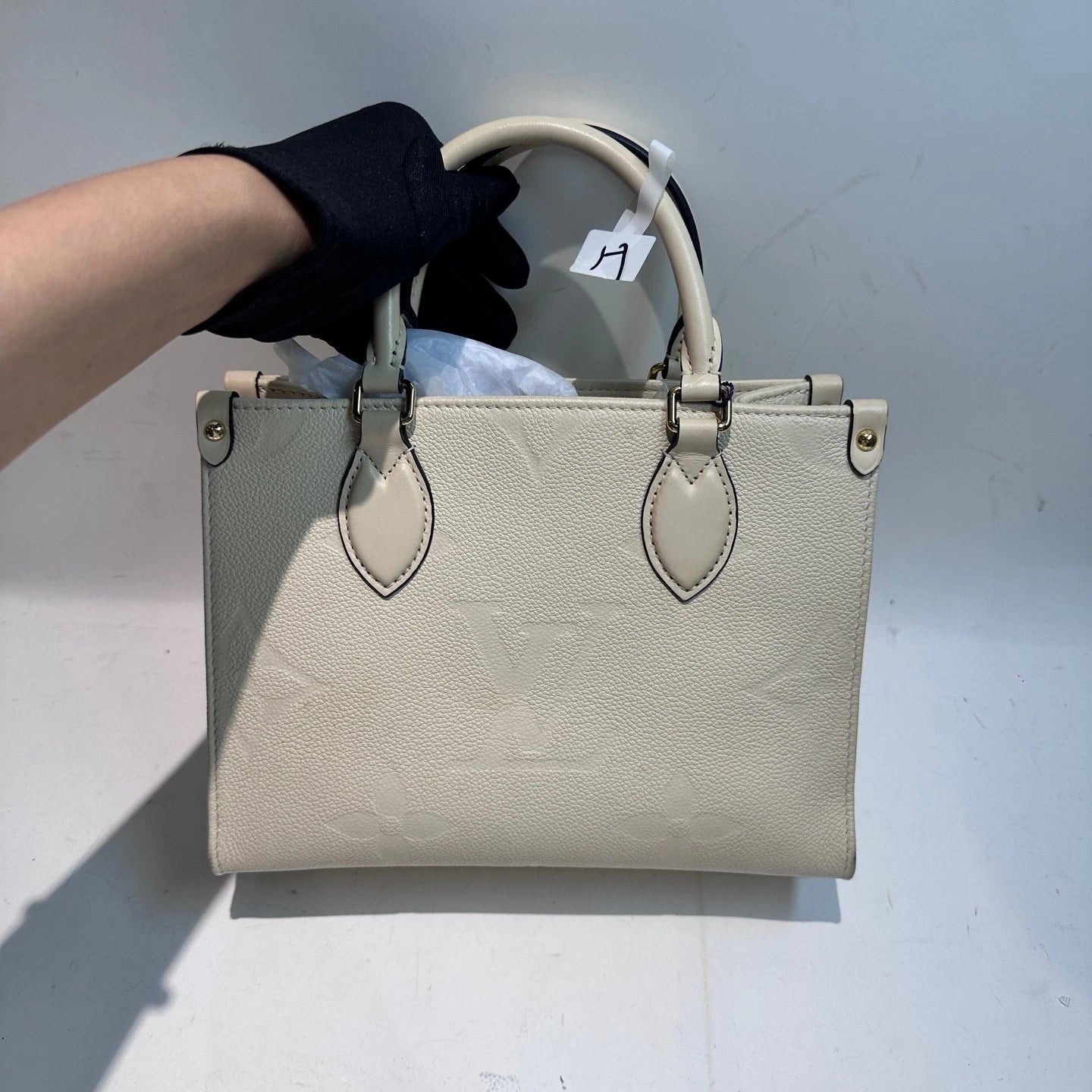 Louis Vuitton Onthego PM Embossed Grainy Leather Tote For Women