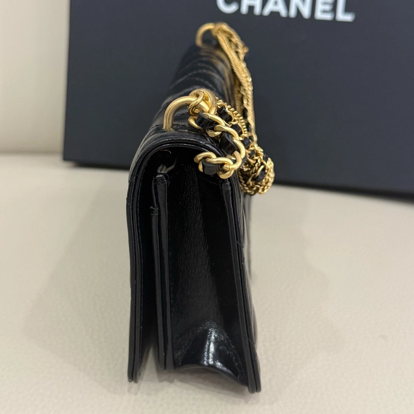 New CHANEL Black Quilted Waxed Leather Twist Chain WOC Crossbody Bag For Women