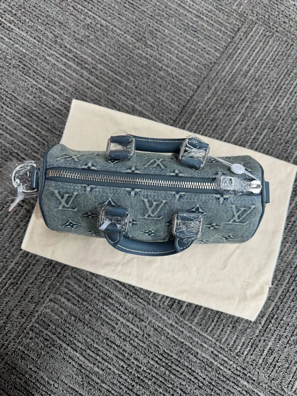 Louis Vuitton Keepall 25 Denim Logo Handbag For Women