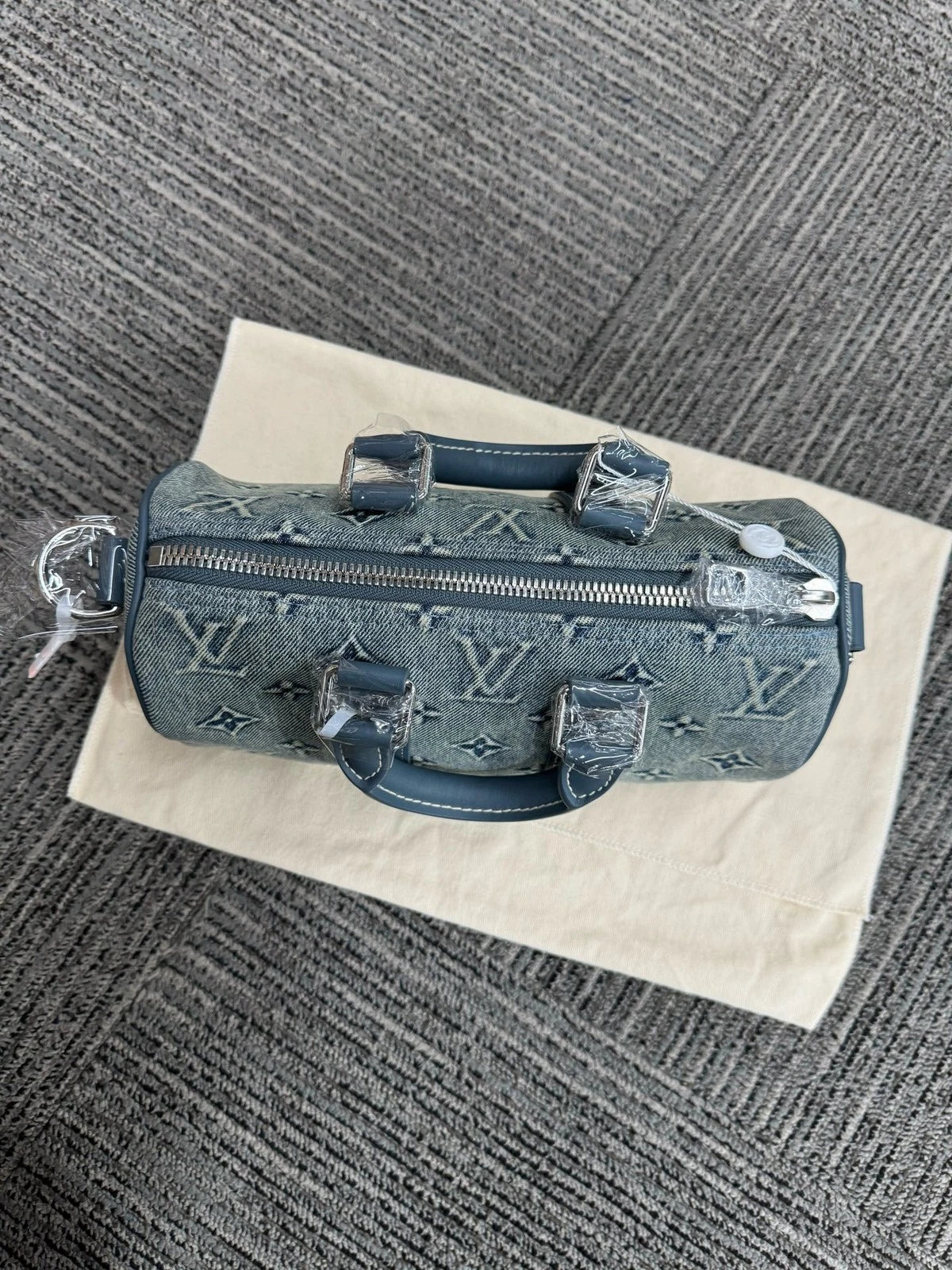 Louis Vuitton Keepall 25 Denim Logo Handbag For Women