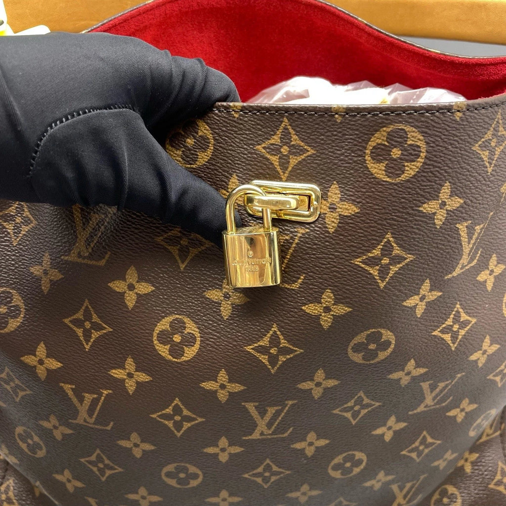Louis Vuitton Gaia Monogram Canvas Brown Handbag Gold Hardware