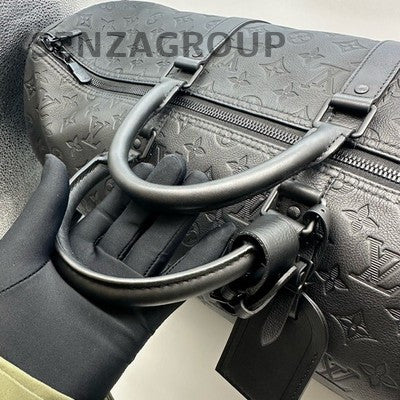 Louis Vuitton Keepall Black Embossed Travel Bag - Unisex Carryall