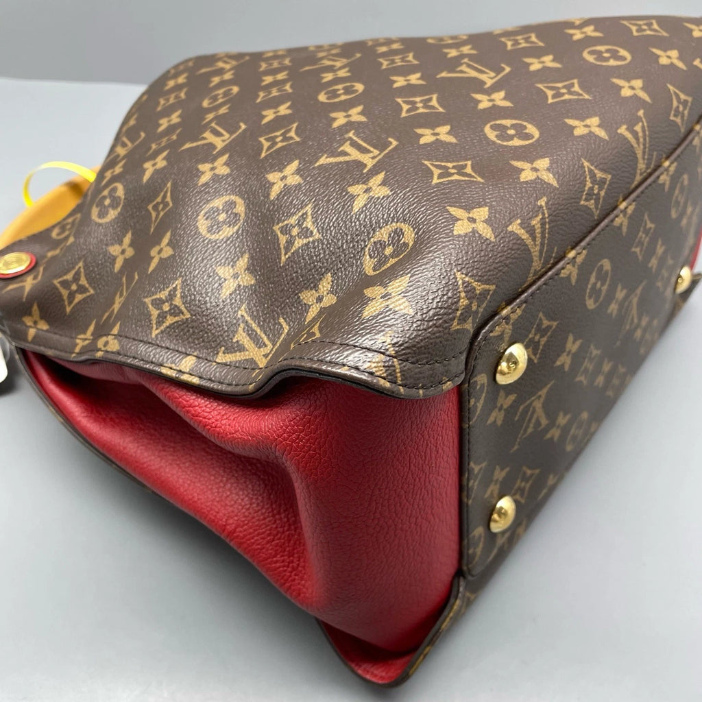 Louis Vuitton Gaia Monogram Canvas Brown Handbag Gold Hardware
