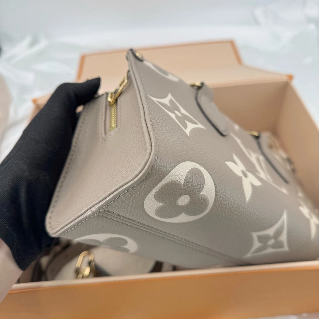 Louis Vuitton Leather Horizontal OnTheGo Tote Bag Elephant Gray For Women