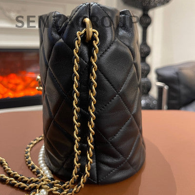 Chanel Quilted Pearl Drawstring Chain Bucket Bag Black Gold Shoulder Bag