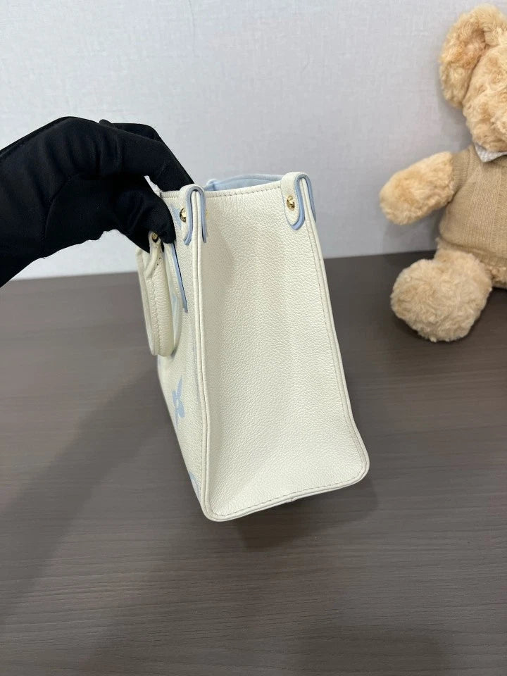 Louis Vuitton OnTheGo PM Empreinte Leather Tote Bag For Women